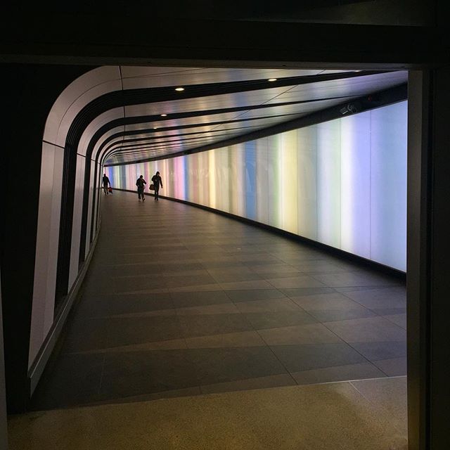 Funky light changing corridor at St Pancras station @eurostar to #Paris #greattrainjourneys #loveparis