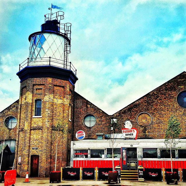 #Londons only #lighthouse at #trinitybouywharf towers over #fatboys #diner #lovelondon #londonlife #photooftheday #history #photography